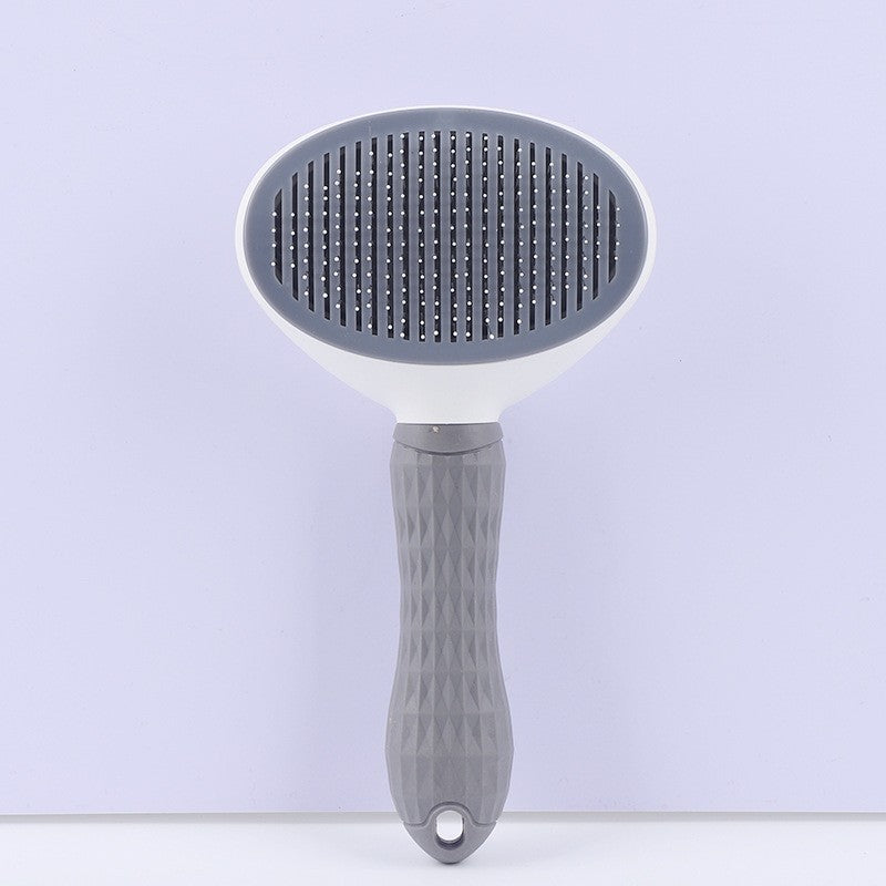 The Furminator’s Assistant™ Self-Cleaning Pet Brush